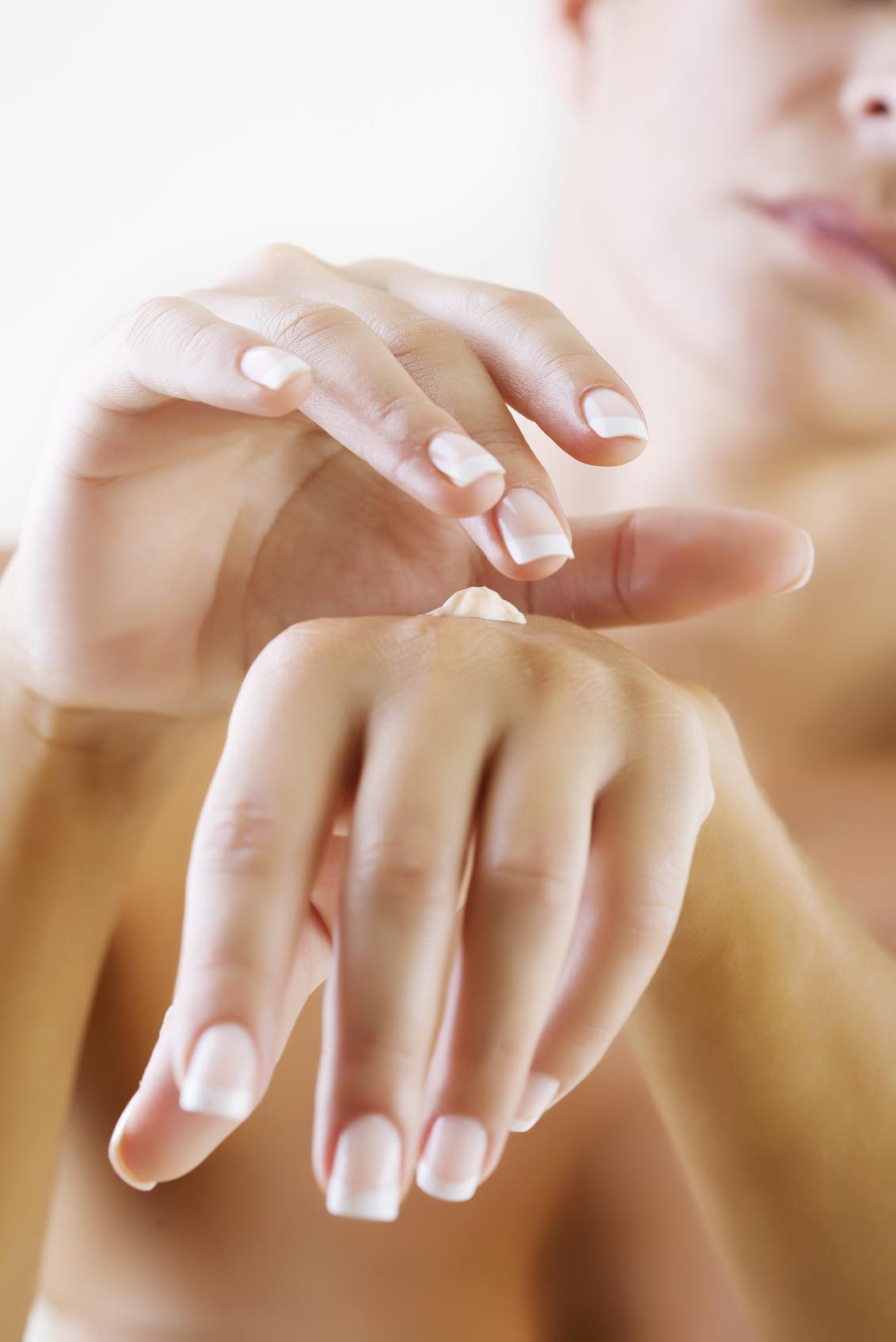 applying hand lotion